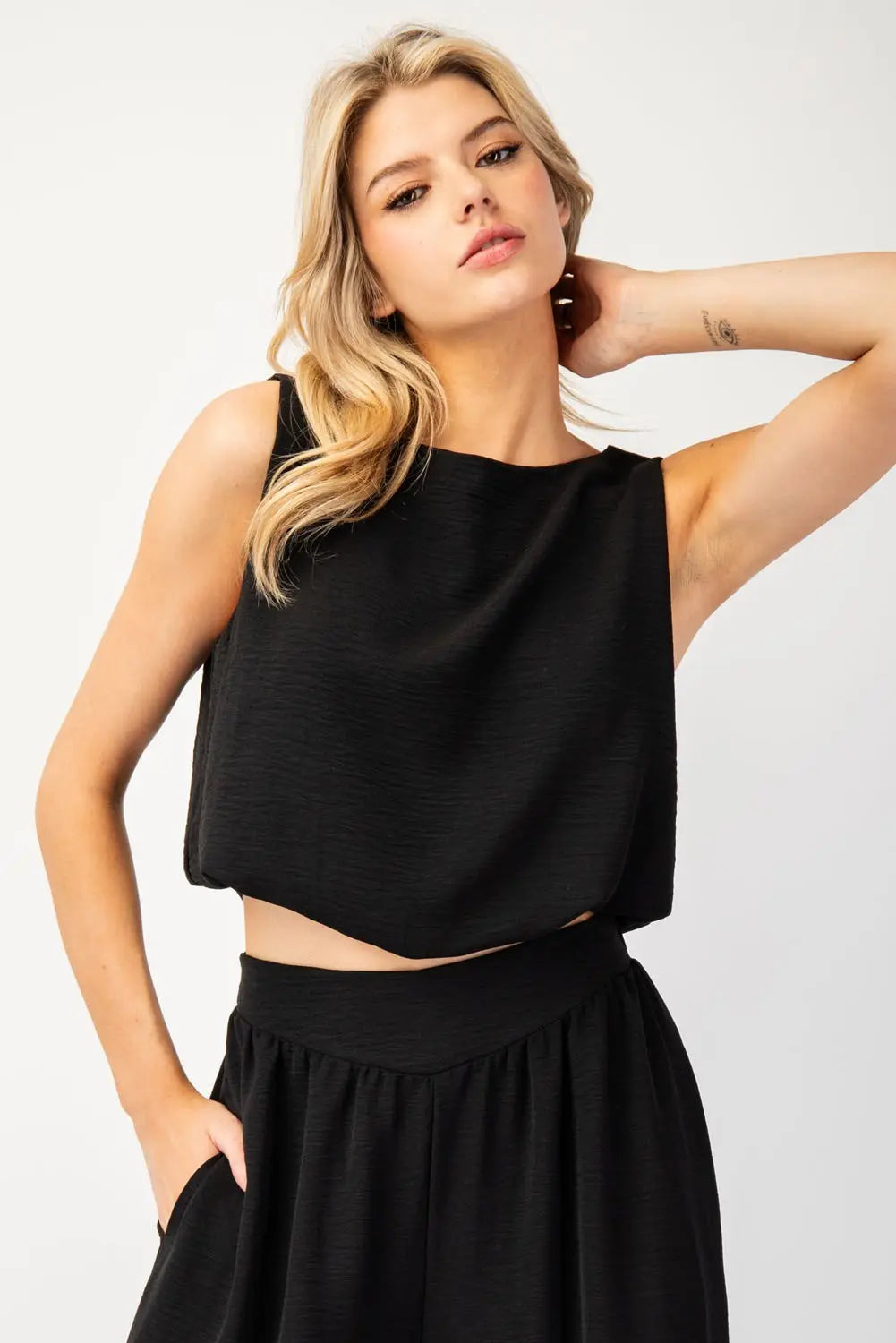 Solid Sleeveless Bubble Crop